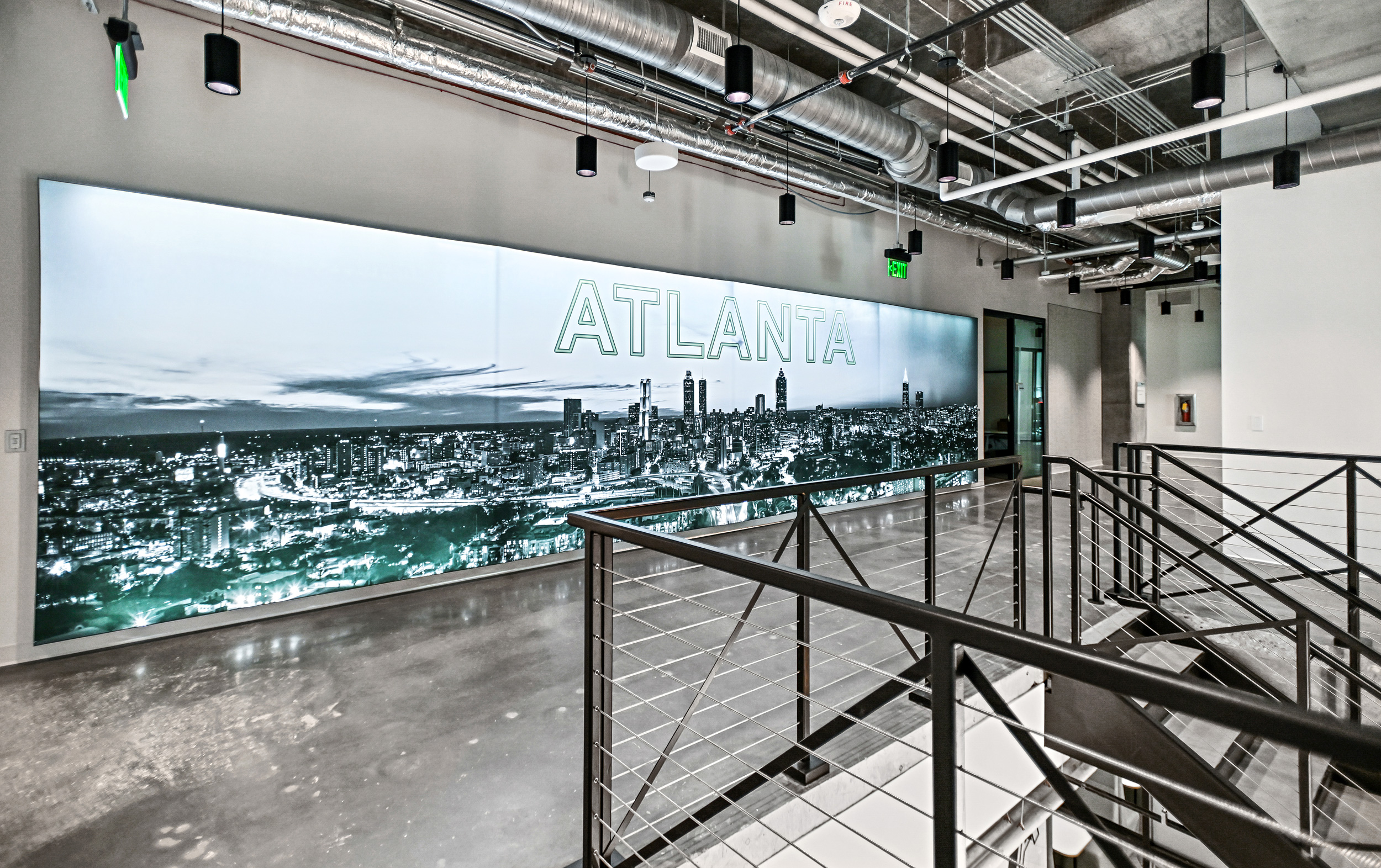 A massive art statement piece of an illuminated silicone edge graphic with a custom printed photo of the Atlanta skyline.